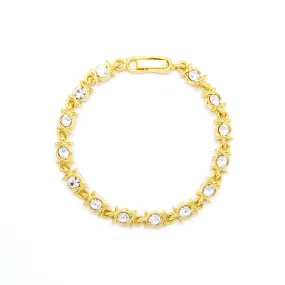 Gold tone link bracelet with clear crystals