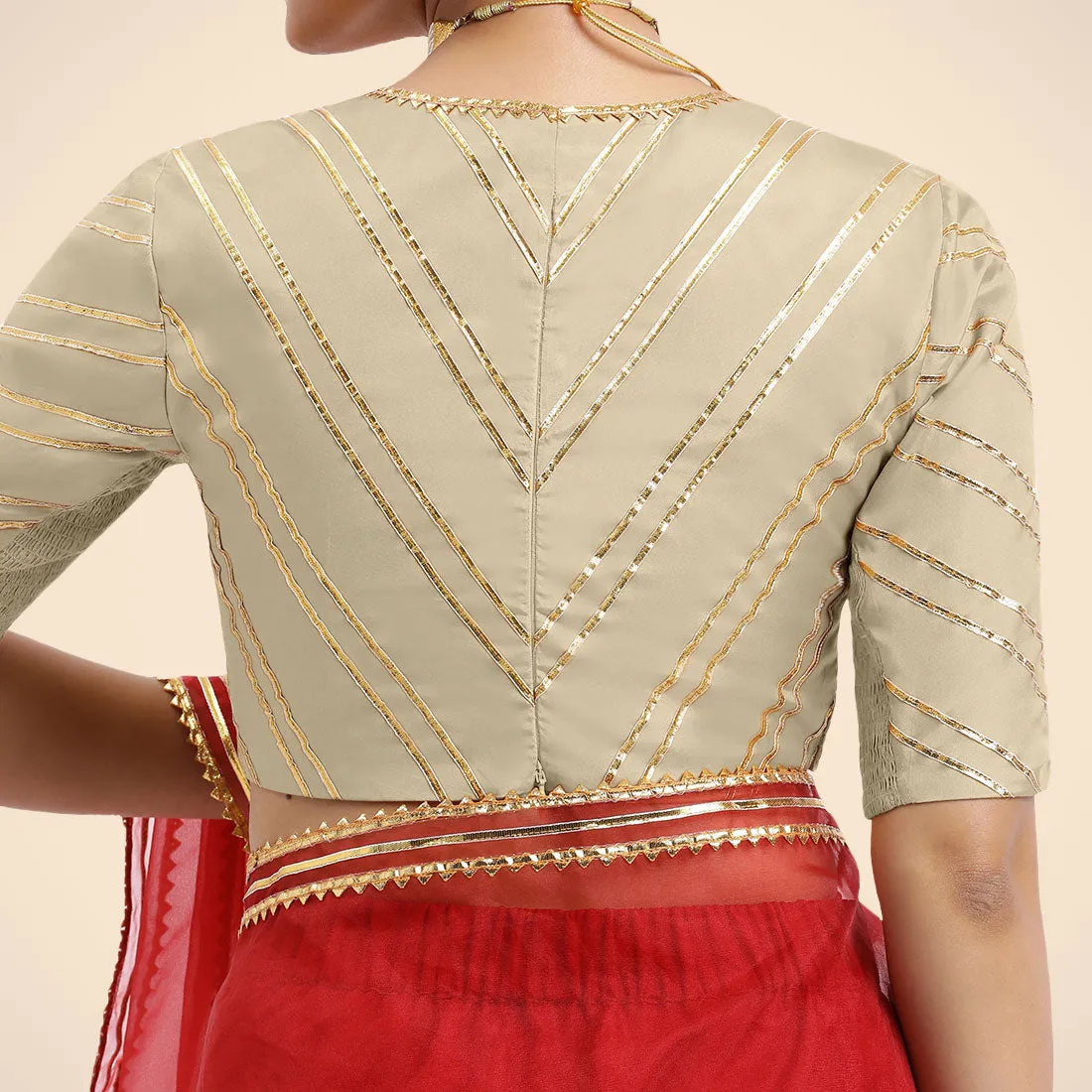 Navya x Tyohaar | Cream Elbow Sleeves FlexiFit™ Saree Blouse with Plunging V Neckline with Tasteful Golden Gota Lace